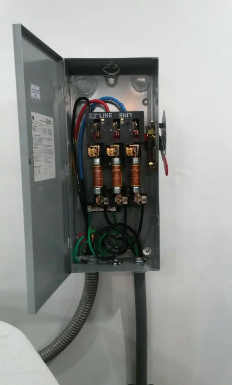 Three-phase disconnect switch installed for Smoke Detector Installation in Reston
